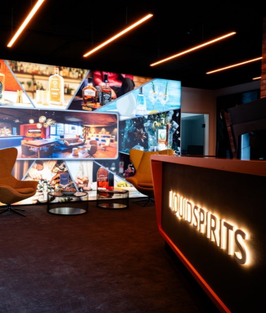 A modern reception desk featuring a glowing 